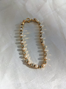 Rhinestone and faux pearl bracelet