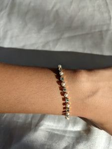 Rhinestone and faux pearl bracelet